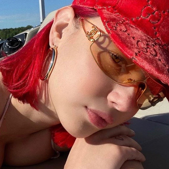 Celebrity Sarah Snyder sporting the same gold tone Chanel frames as listed